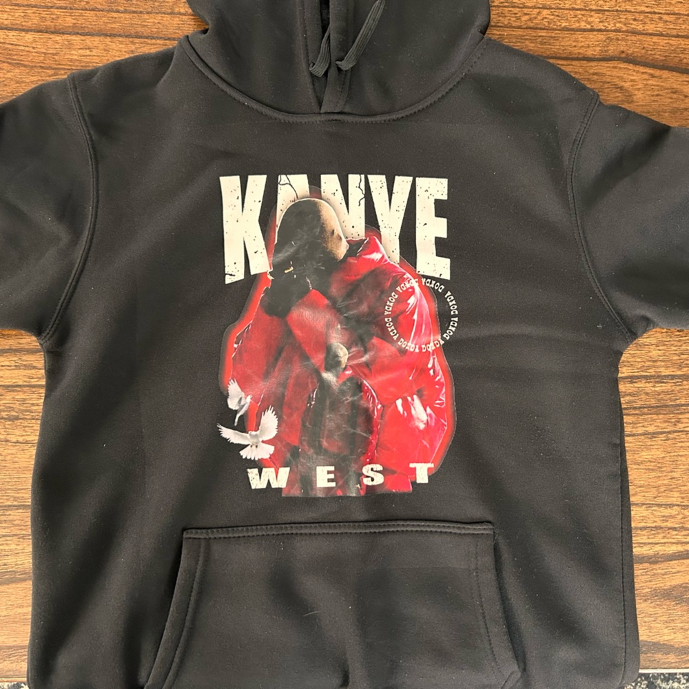 Kanye Donda hoodie
Black Kids' Graphic Hoodie with Red Accent